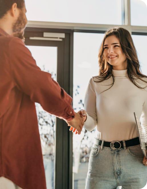 Agent and client shaking hands